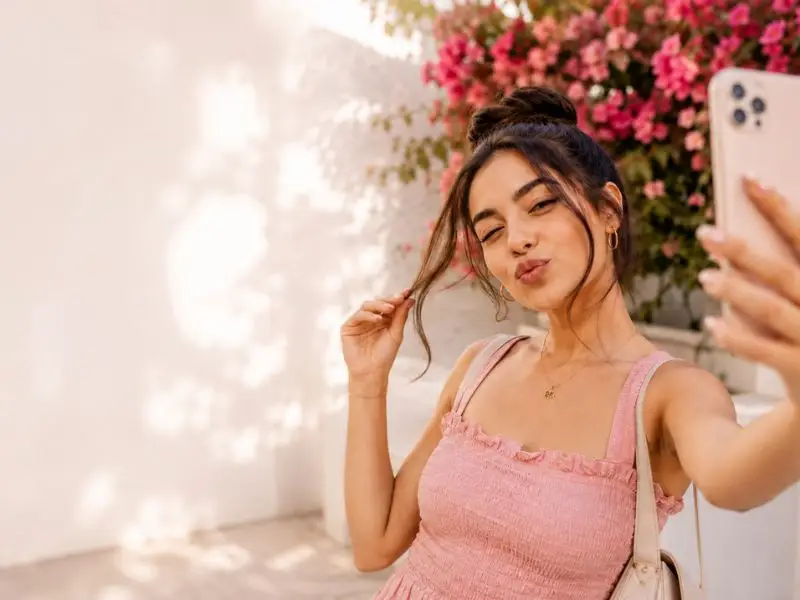 The Hair Flip or Hair Play Pose